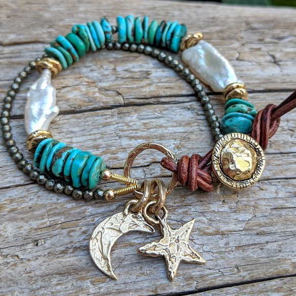 Turquoise bracelet with pearl, pyrite and gold bronze crescent moon and star charms and button, by Aurora Creative Jewellery