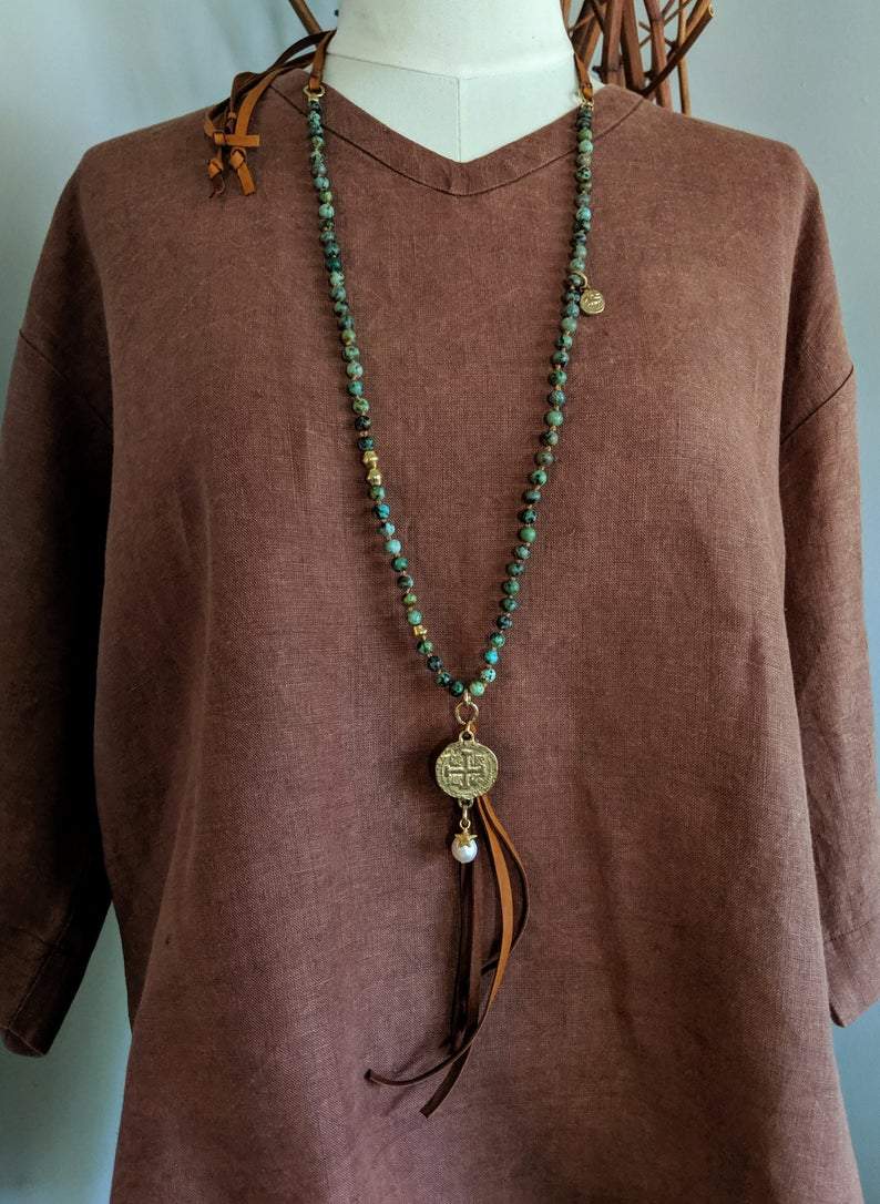 Handmade artisan African turquoise and leather rustic boho pendant necklace by Aurora Creative Jewellery