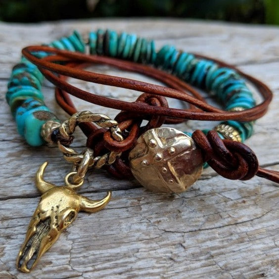 Turquoise leather wrap bracelet necklace with gold bronze cow skull and button, by Aurora Creative Jewellery