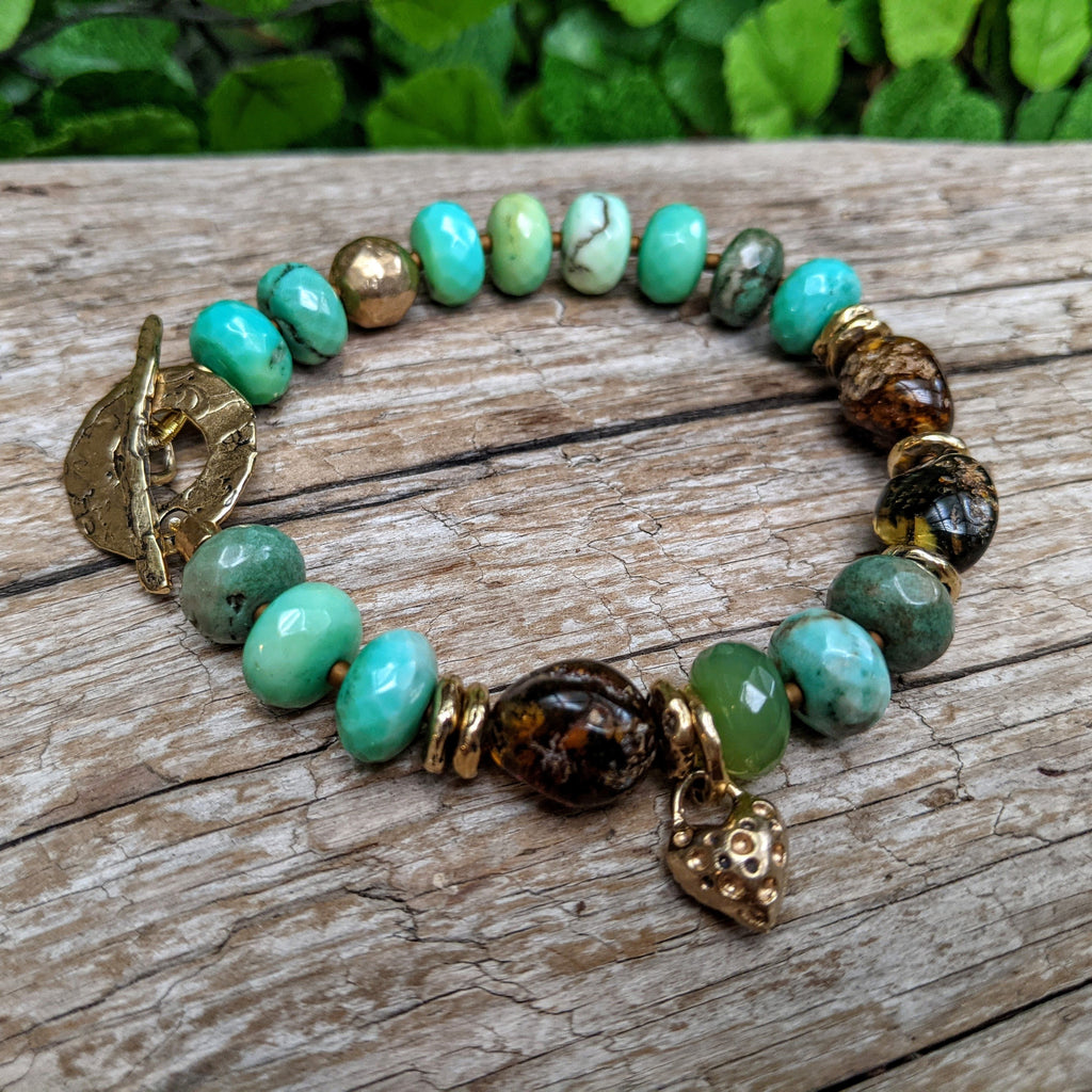 Forest green chrysoprase bracelet with raw Baltic amber & artisan gold bronze. Rustic chunky gemstone bracelet handcrafted by Aurora Creative Jewellery.