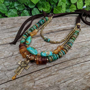 Genuine turquoise, Baltic amber multi strand boho necklace. Bronze cross necklace. Created by Aurorq creative jewellery.