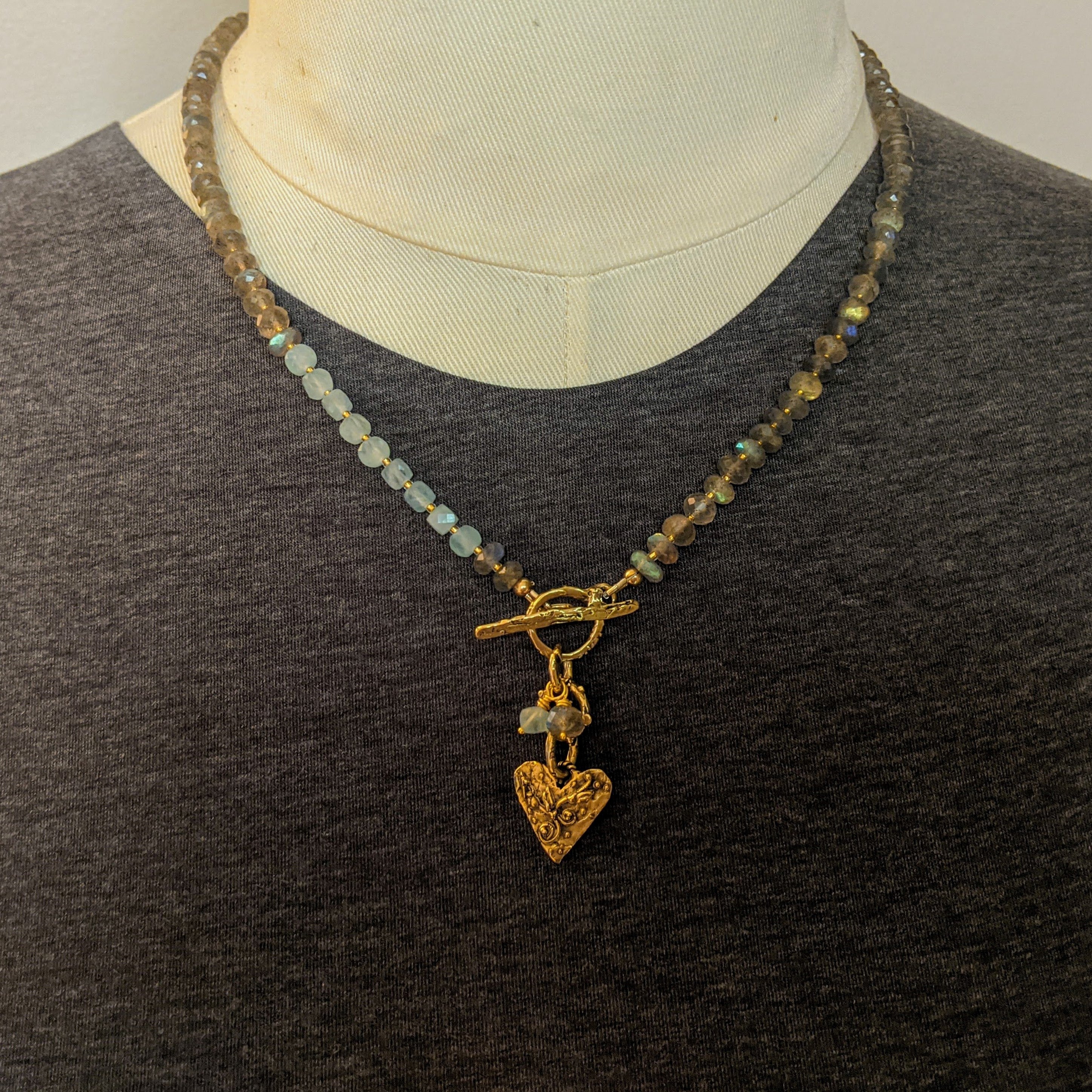 Labradorite artisan necklace with gold bronze artisan elements. Created by Aurora Creative Jewellery.