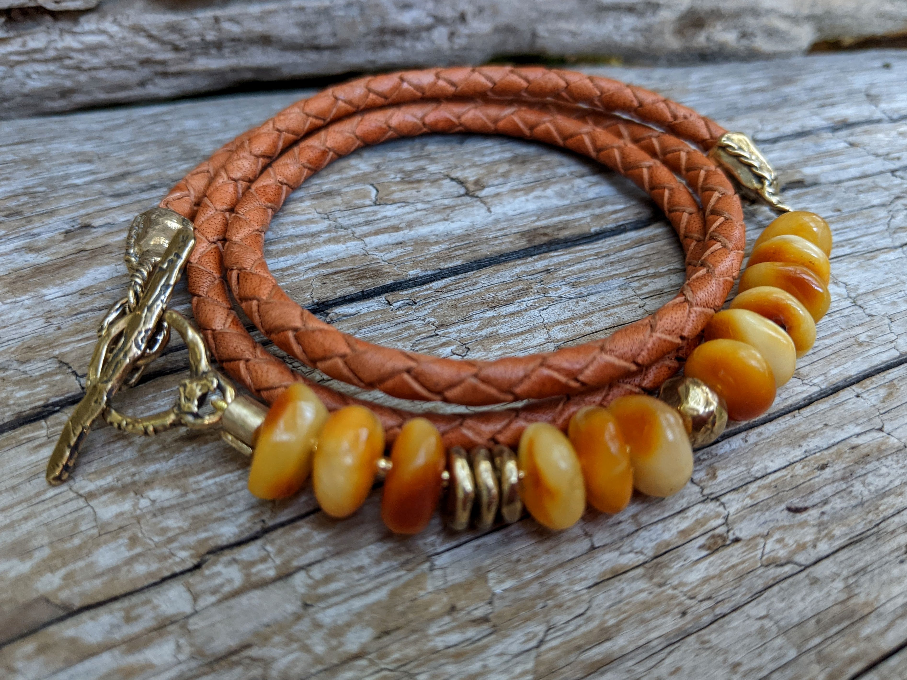 Baltic amber wrap bracelet. Egg Yolk amber bracelet. Butter Scotch amber bracelet. Boho bracelet. Handcrafted by Aurora Creative Jewellery.