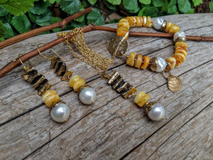 Egg Yolk Amber pearl pendant necklace. Organic jewelry. Handcrafted by Aurora Creative Jewellery.