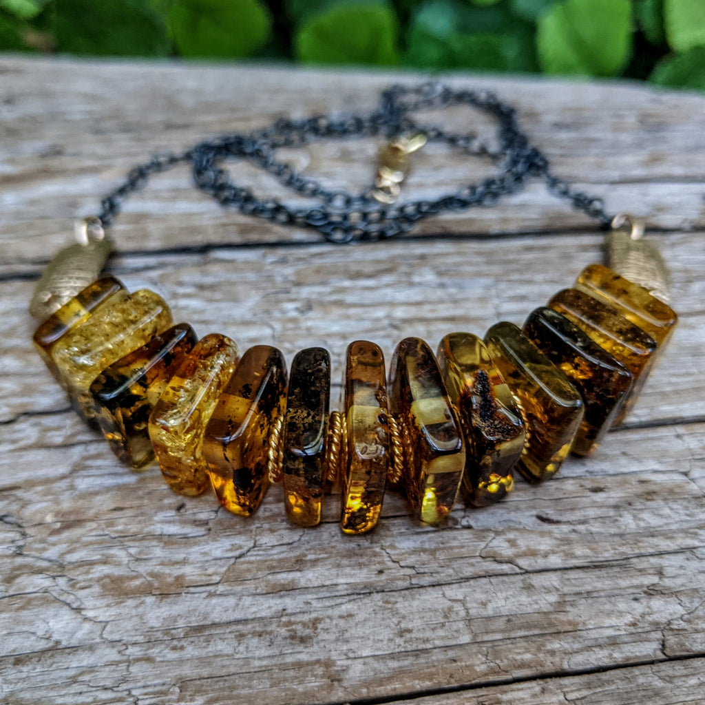 Baltic amber artisan necklace, genuine amber necklace with oxidized silver chain and gold bronze elements. Created by Aurora Creative Jewellery.
