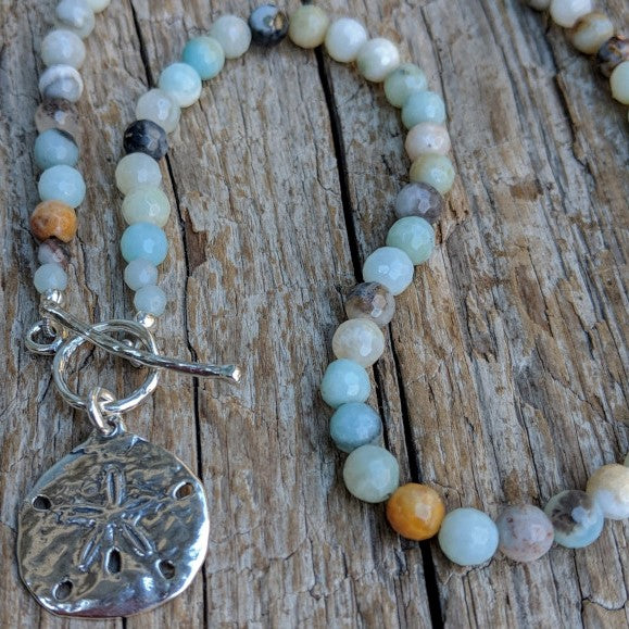 Light blue amazonite stone necklace with silver sand dollar and toggle, by Aurora Creative Jewellery