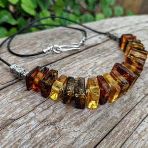 Baltic amber necklace. Organic jewelry. Earthy jewelry. Leather amber necklace. Handcrafted by Aurora Creative Jewellery.