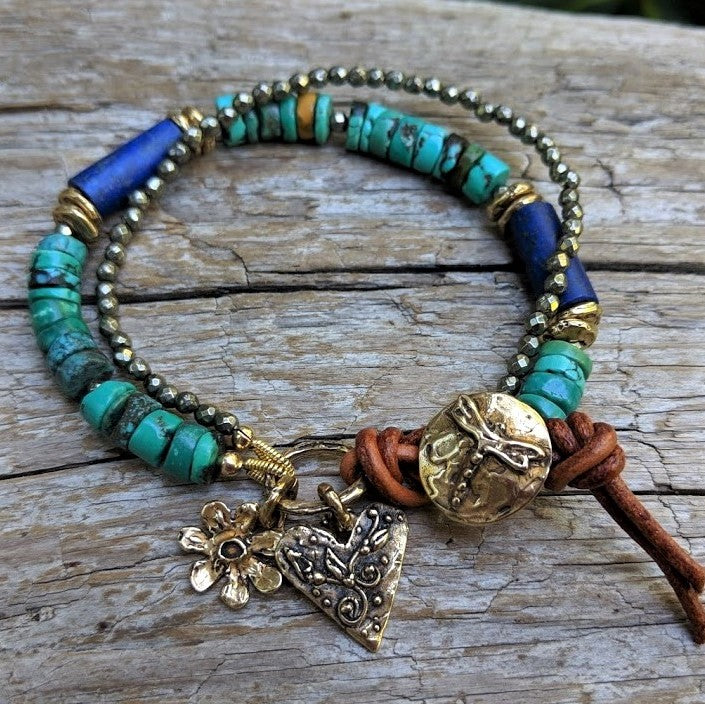 Tibetan turquoise, lapis lazuli, and pyrite bracelet with flower & heart charms, dragonfly button and leather, by Aurora Creative Jewellery