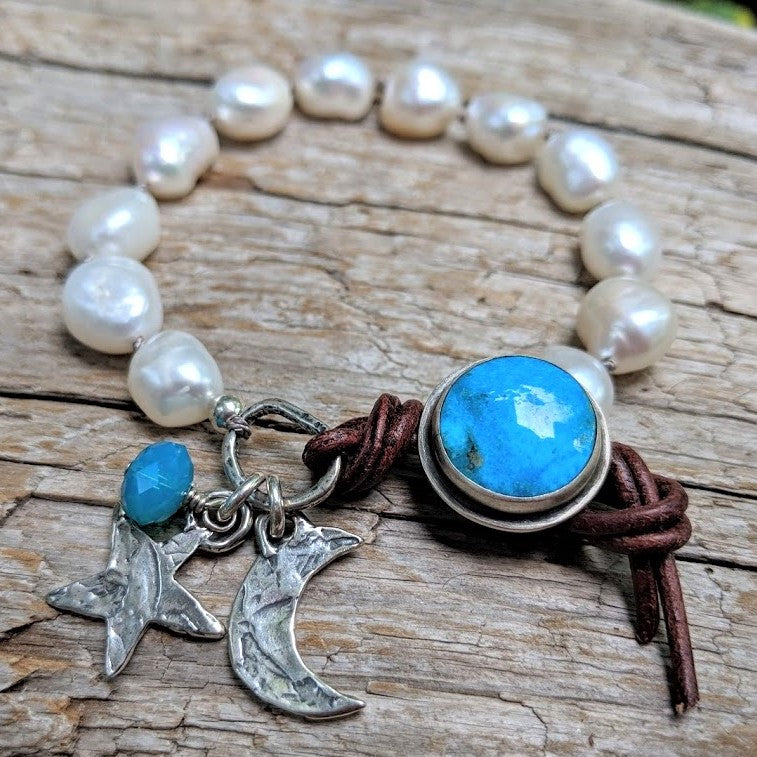 Turquoise and pearl bracelet with crescent moon, star and Swarovski crystal charms, by Aurora Creative Jewellery