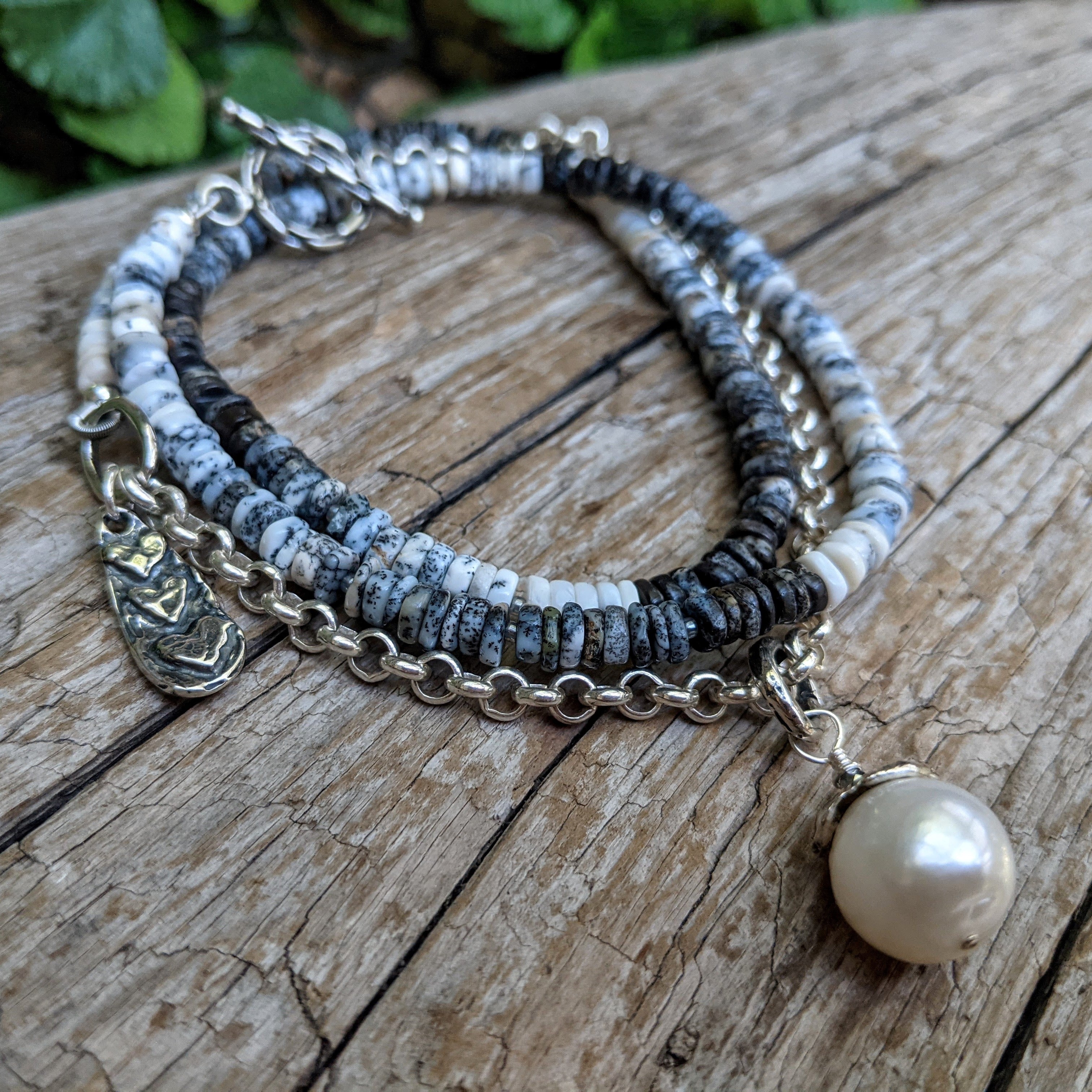Handmade artisan long grey gemstone  necklace with dendritic opal, white Edison pearl pendant and sterling silver, design and handcrafted by Aurora Creative Jewellery.