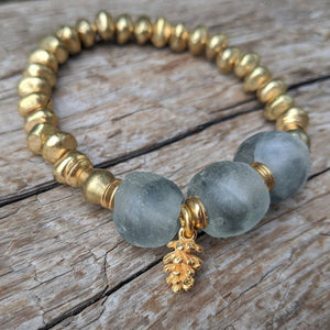 Gray and gold glass bracelet with gold pine cone charm by Aurora Creative Jewellery