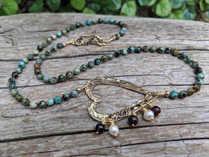 African turquoise and garnet necklace with asymmetric heart pendant with pearls and garnet by Aurora Creative Jewellery