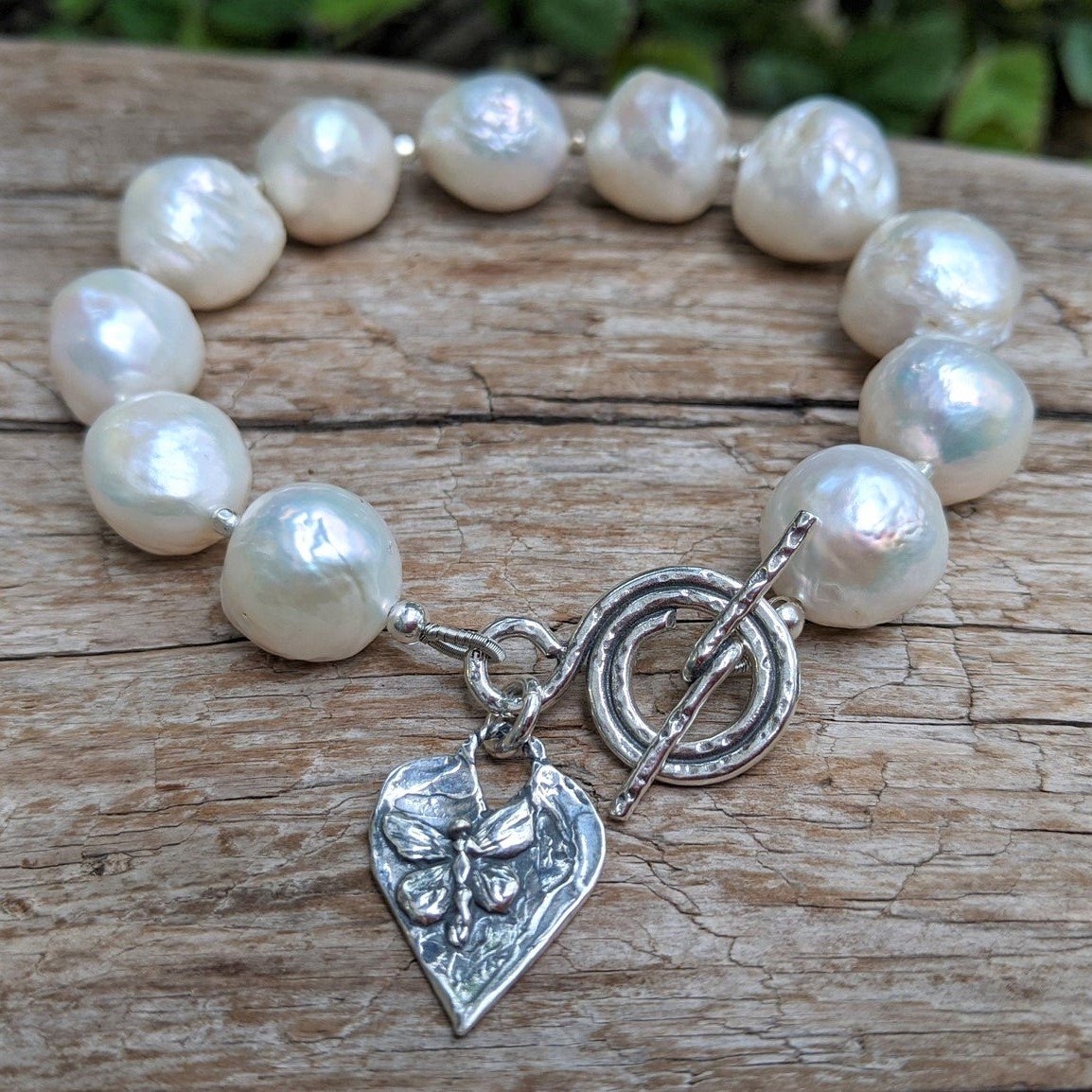 Freshwater pearl toggle bracelet in sterling silver.