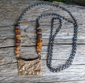 Baltic amber horse pendant necklace on oxidized sterling silver chain by Aurora Creative Jewellery