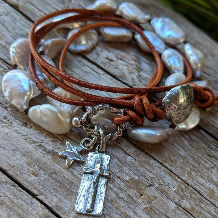 Large pearl leather wrap bracelet-necklace with silver cross charm by Aurora Creative Jewellery