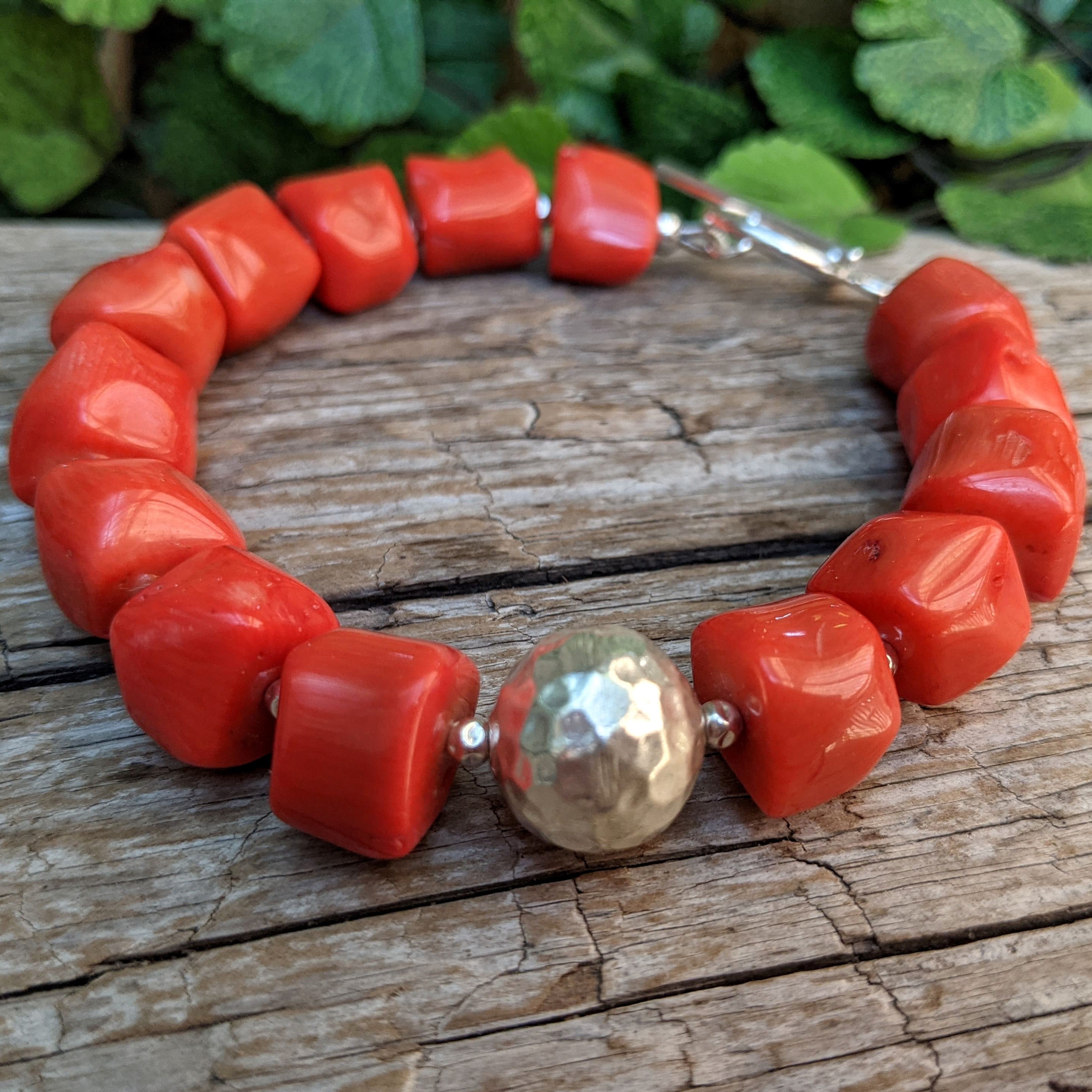 Orange coral and silver bracelet. Statement organic bracelet. Handcrafted by Aurora Creative Jewellery.