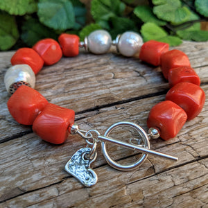 Orange coral bracelet & white Edison pearl bracelet. Rustic chunky bracelet. Handcrafted by Aurora Creative Jewellery.