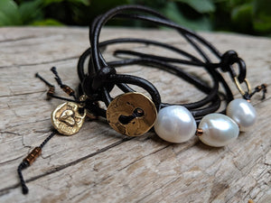 Pearl and black leather wrap bracelet with a button - by Aurora Creative Jewellery