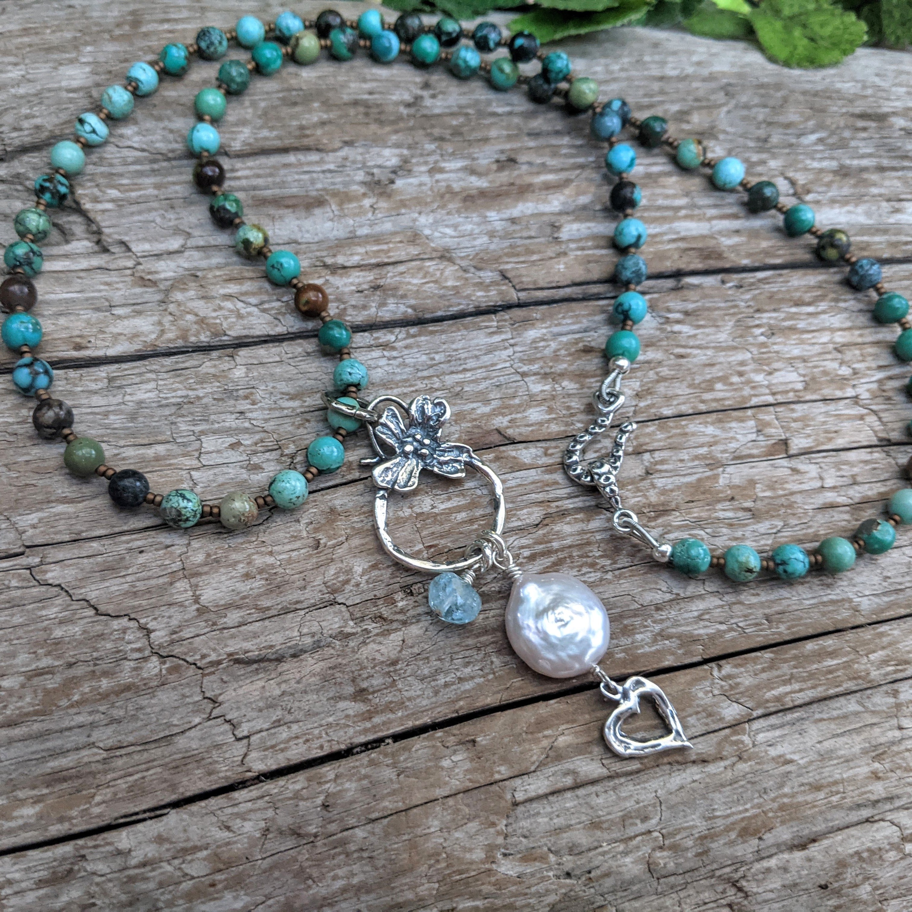 Genuine turquoise necklace with sterling silver flower, big pearl pendant. Rustic turquoise boho necklace handcrafted by Aurora Creative Jewellery.
