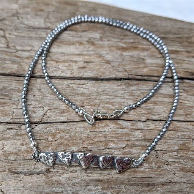 Silver hearts and silver hematite thin dainty gemstone necklace by Aurora Creative Jewellery