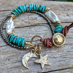 Turquoise bracelet with pearl, pyrite and gold bronze crescent moon and star charms and button, by Aurora Creative Jewellery
