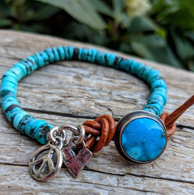 Tibetan turquoise bracelet with silver heart and peace charms, by Aurora Creative Jewellery
