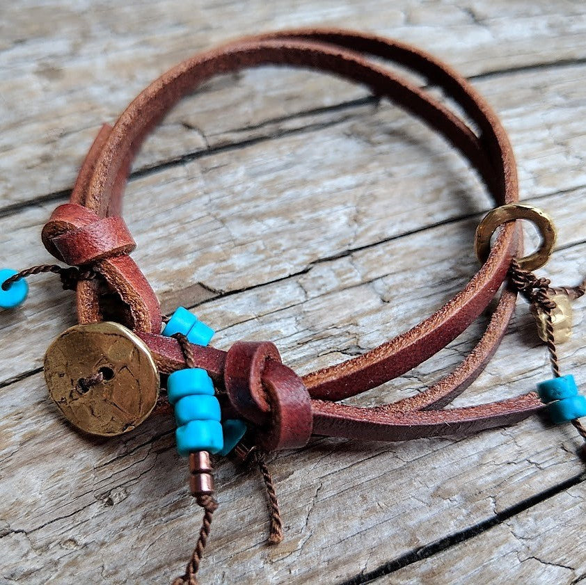 Turquoise leather wrap bracelet with heart charm and button by Aurora Creative Jewellery