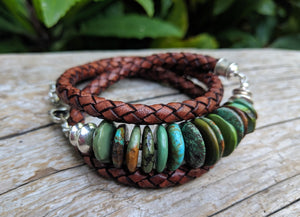 This handmade artisan turquoise and leather wrap bracelet is a chic and bright accessory that makes a statement. The beautiful rich earth colors of turquoise are complimented by brown leather and sterling silver elements. The leather is thick, but feels soft to the touch and is comfortable to wear. Wearing this bracelet feels like taking a nature walk in the forest and absorbing the beauty of natural organic colors and textures.