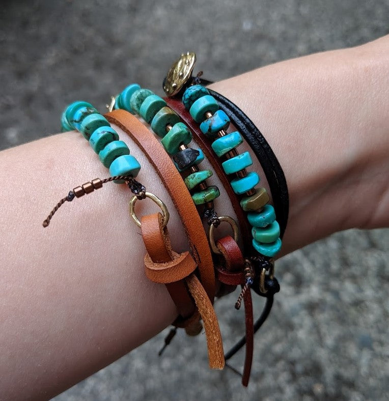 This fun handmade artisan boho leather wrap bracelet showcases the beauty of natural textures. The vibrant natural turquoise gives a pop of color on the background of natural leather.  The bracelet is finished off with a gold bronze button and leather loop. A heart charm adds another touch of gold and an element of fun. The heart charm can freely move around the bracelet so you can enjoy it from all sides. 