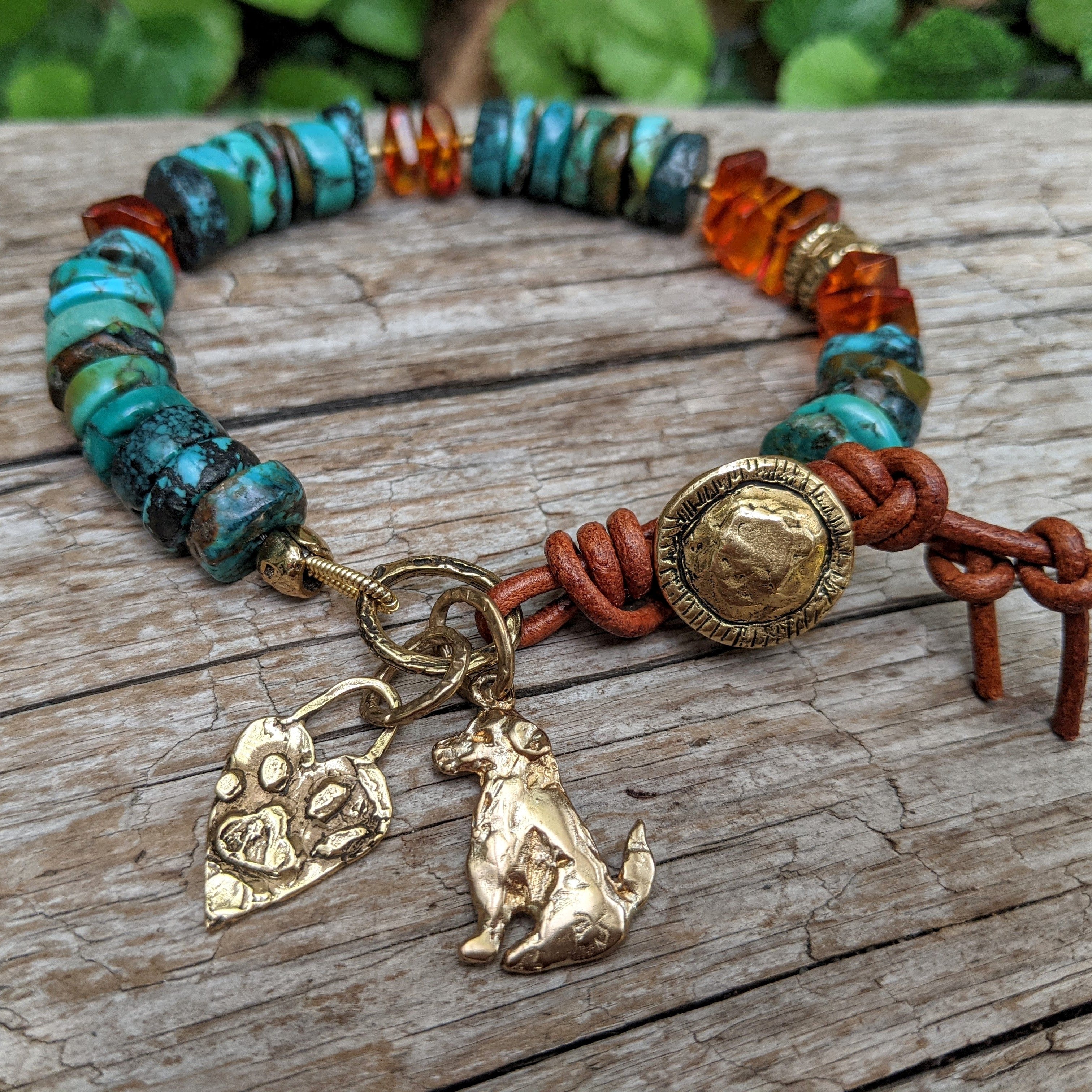 Rustic turquoise bracelet with Baltic amber and gold bronze charms dog and paw.