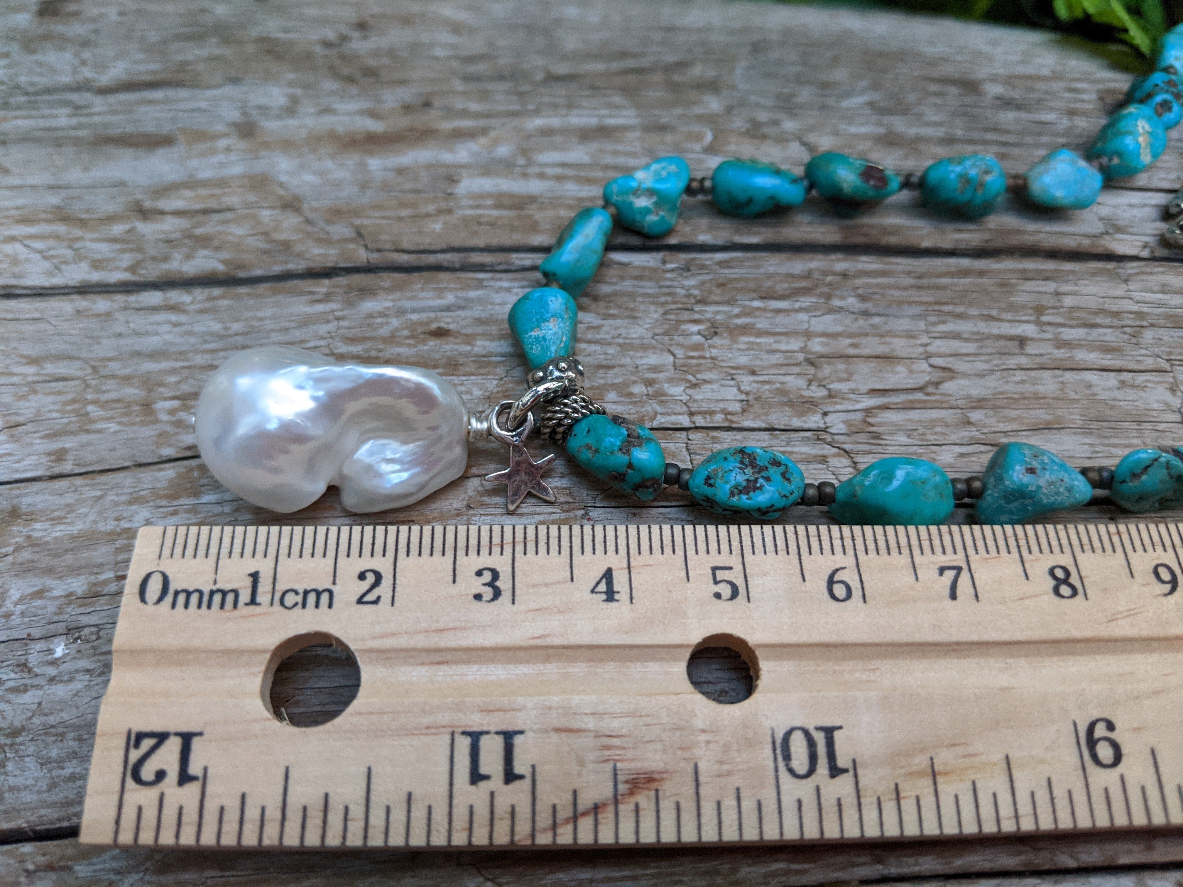 Turquoise necklace with big baroque pearl pendant. Statement boho necklace. Handcrafted by Aurora Creative Jewellery.