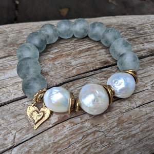 Handmade artisan large white pearl bracelet with gray blue recycled glass and gold bronze heart charm by Aurora Creative Jewellery